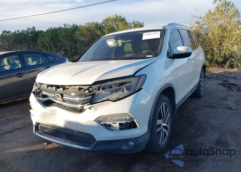 2017 Honda Pilot Touring z USA, uszkodzony, nr VIN 5FNYF6H92HB017760